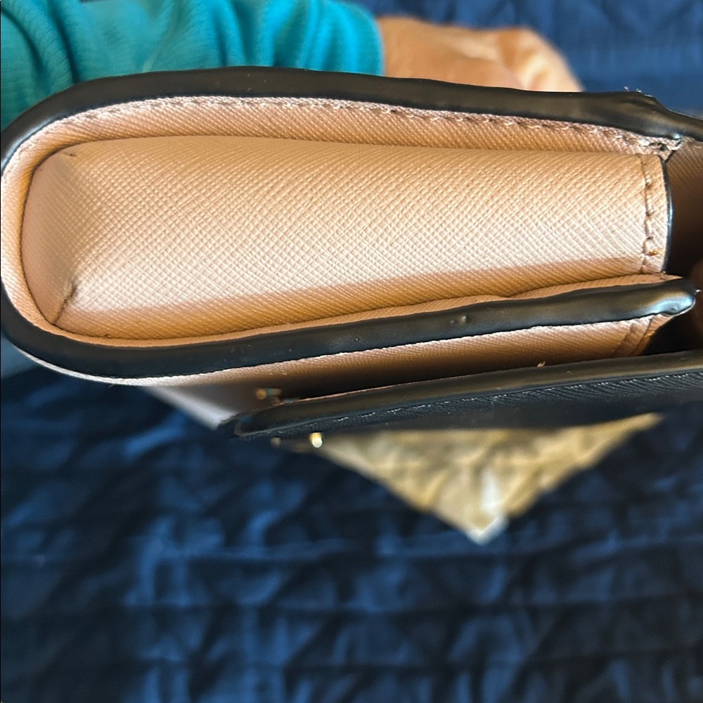 Kate Spade New York Laurel Way Winni crossbody in a two-tone black/light pink. - Picture 6 of 11